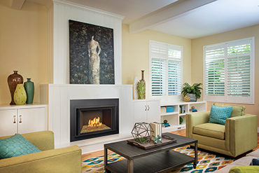Lopi gas insert in white shiplap room
